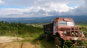 I loved this truck parked in a yard in the middle of nowhere. The village of Mawlaingut lies just behind and the city of Shillong is on the plateau in the distance